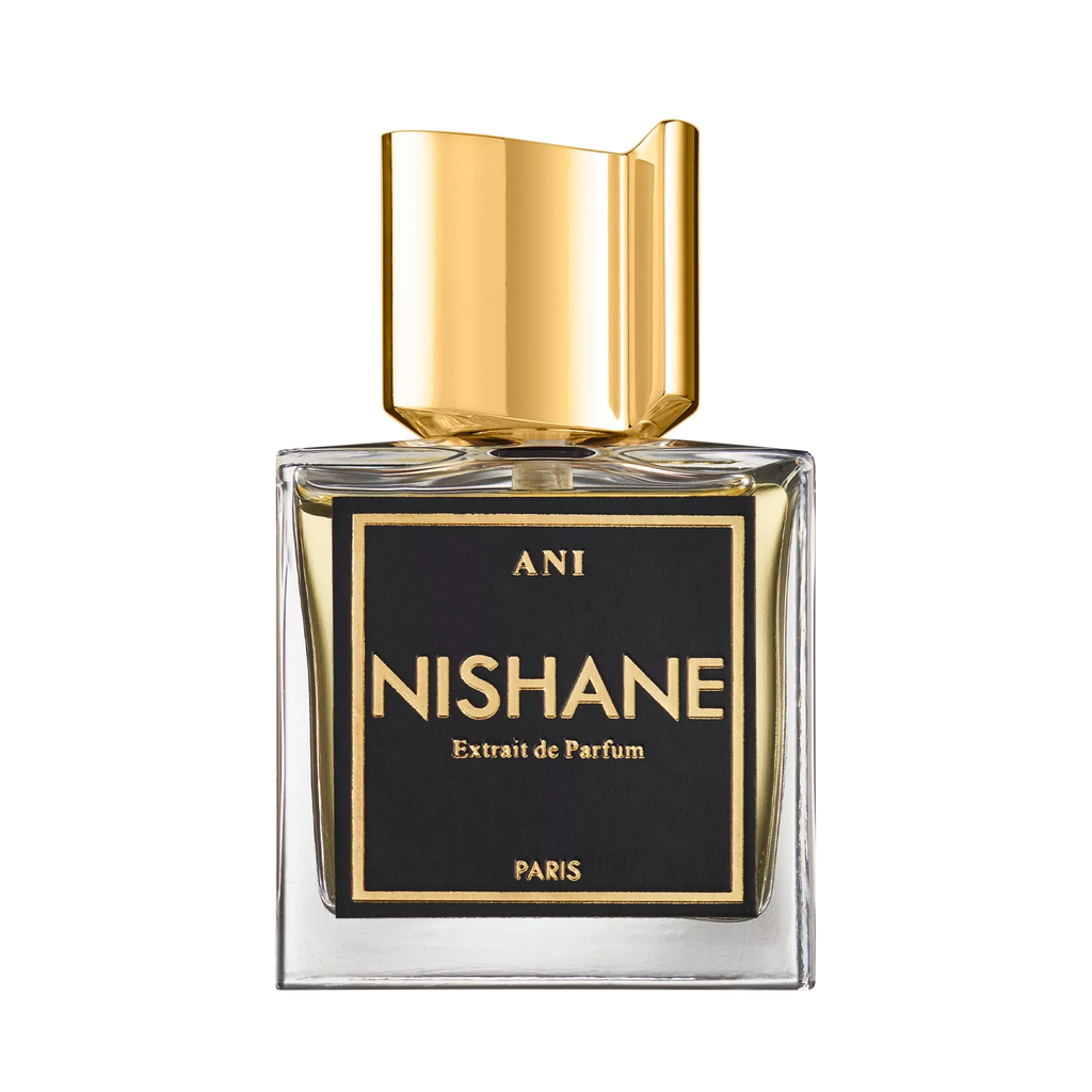 Nishane perfume bottle with gold cap on a white background