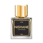 Nishane perfume bottle with gold cap on a white background