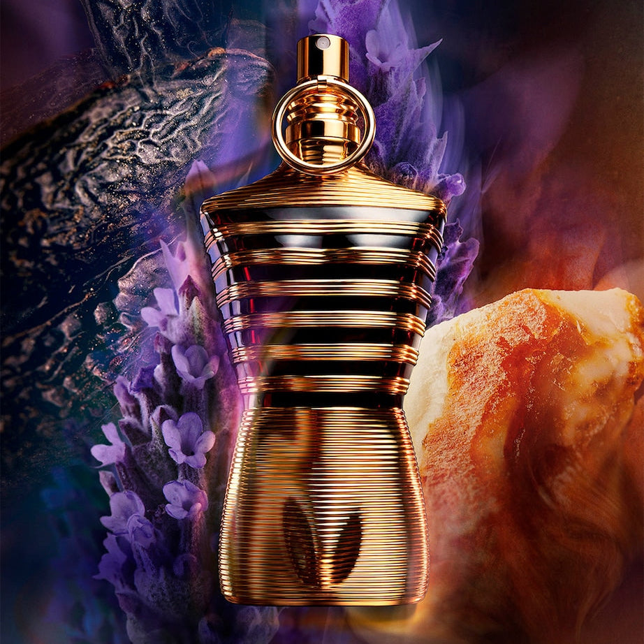 Gold perfume bottle with floral and fruit background