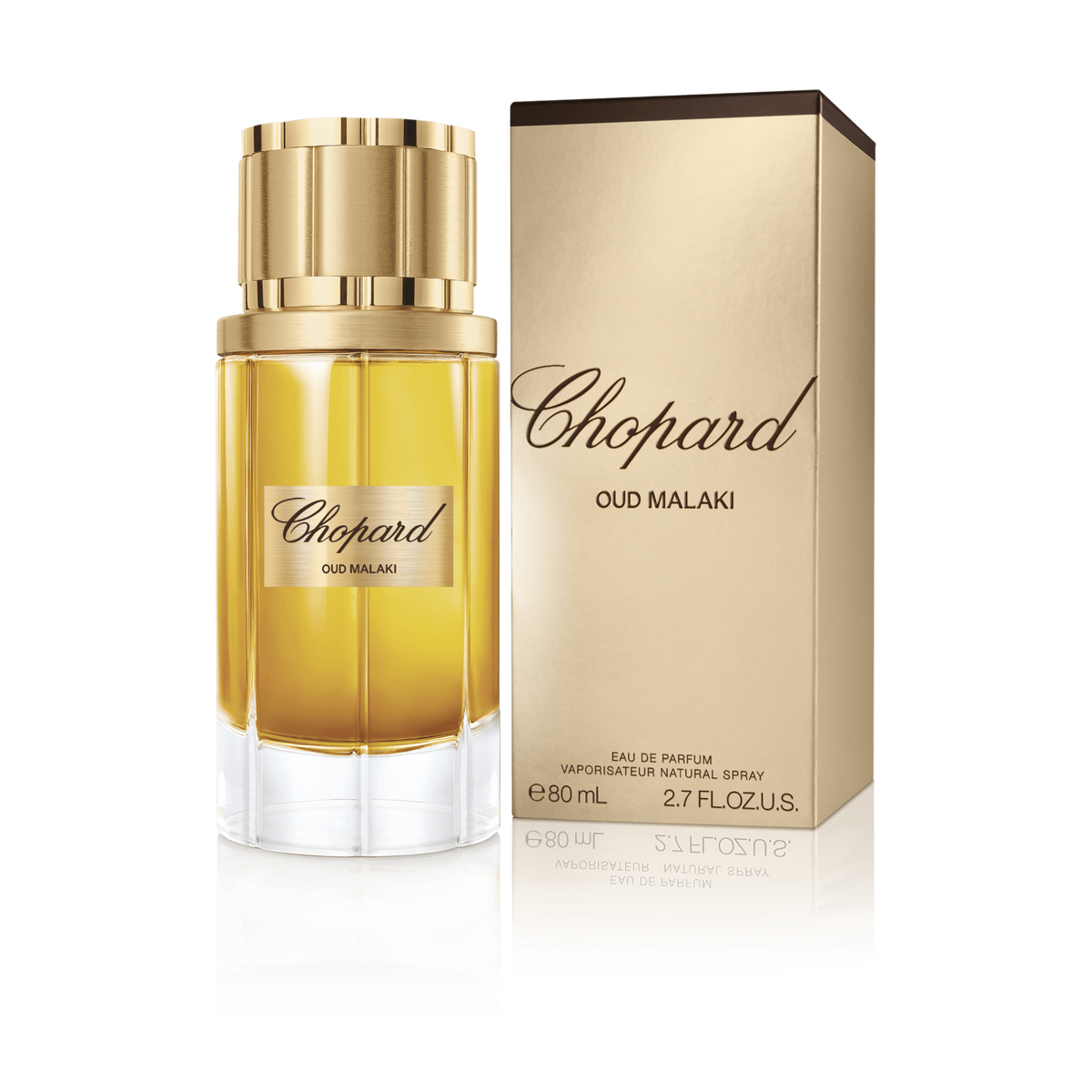 Chopard Oud Malaki perfume bottle and packaging on a green background