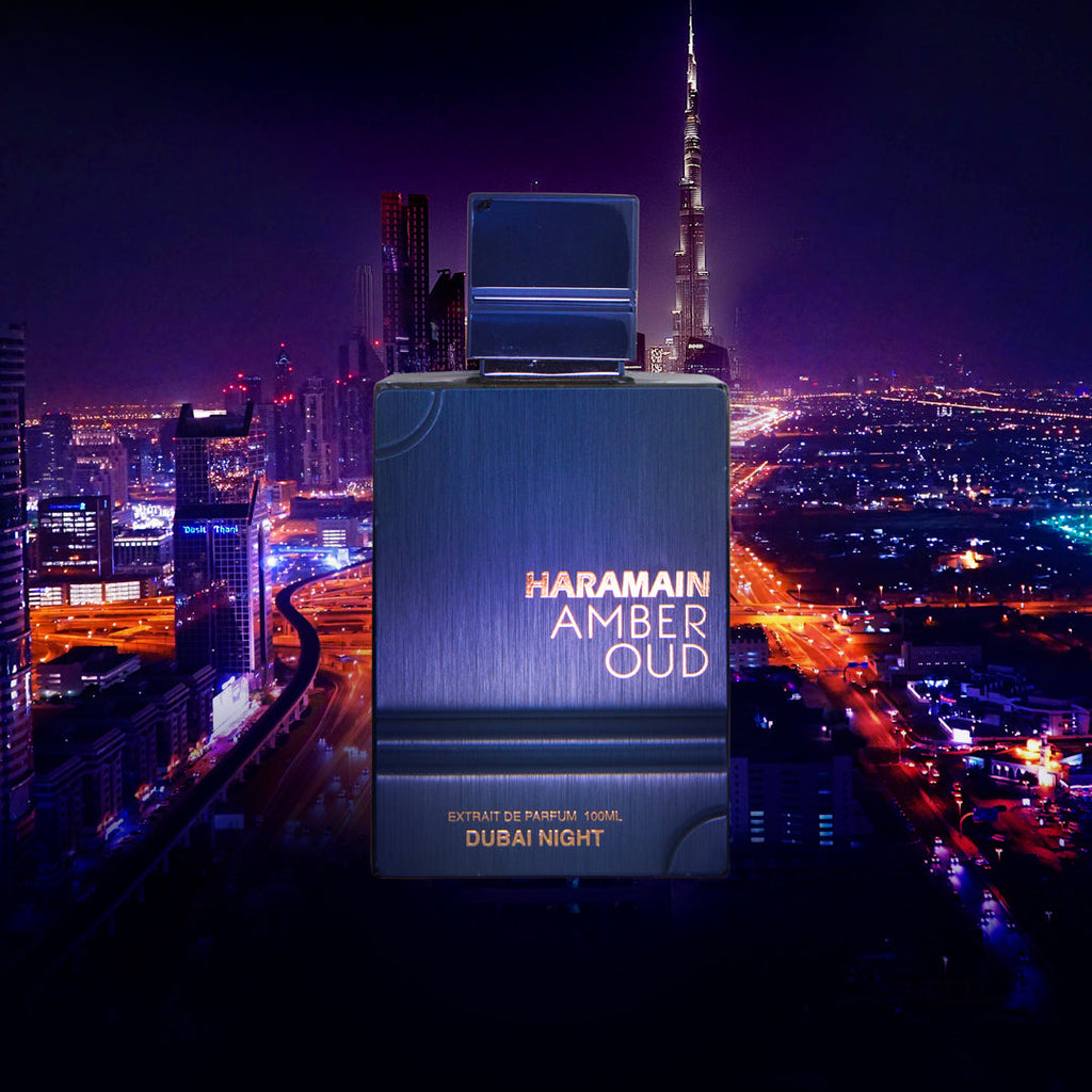 Haramain Amber Oud perfume bottle with Dubai skyline in the background