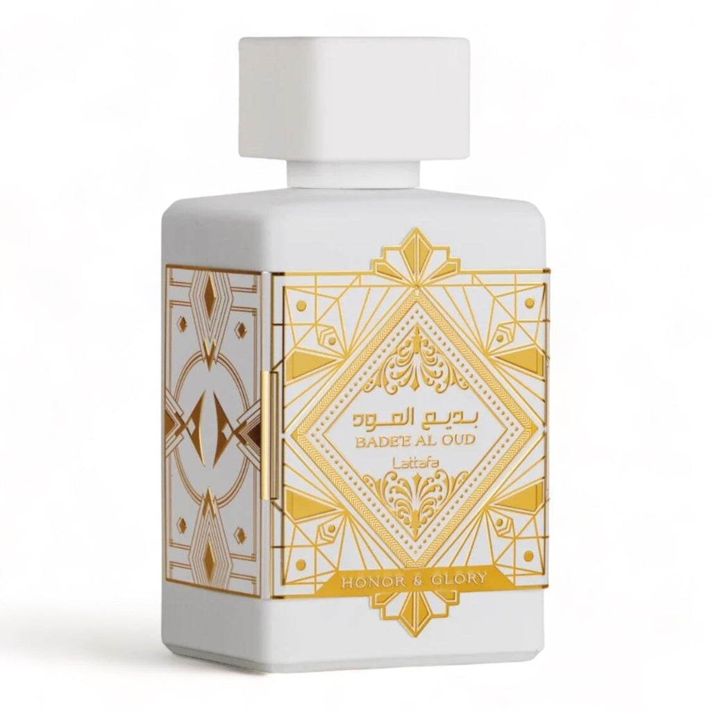 Perfume bottle Lattafa Bade’e Al Oud Honour & Glory with gold geometric design on a white background
