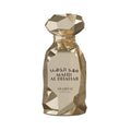 Mahd Al Dhahab Arabiyat Prestige Gold perfume bottle with geometric design on a white background