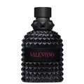 Black perfume bottle with diamond pattern and 'Valentino' branding on a white background