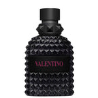 Black perfume bottle with diamond pattern and 'Valentino' branding on a white background